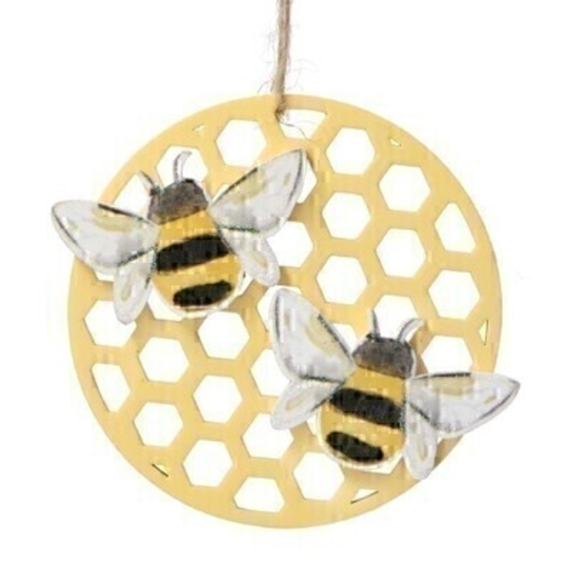 A yellow wooden honeycomb hanging decoration featuring 2 bumble bees. Made by London based designer Gisela Graham who designs really beautiful gifts for your home and garden.  Would suit any home decor and would make a lovely gift. Matching items available. 